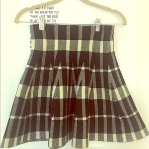 Black and white high-waisted flare mini